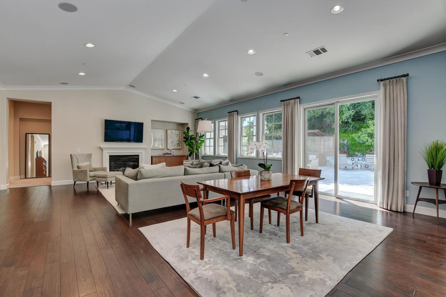 181 Mansfield Drive Mountain View, CA 94040 - Photo 9 of 44 a view of a dining room with furniture window and wooden floor