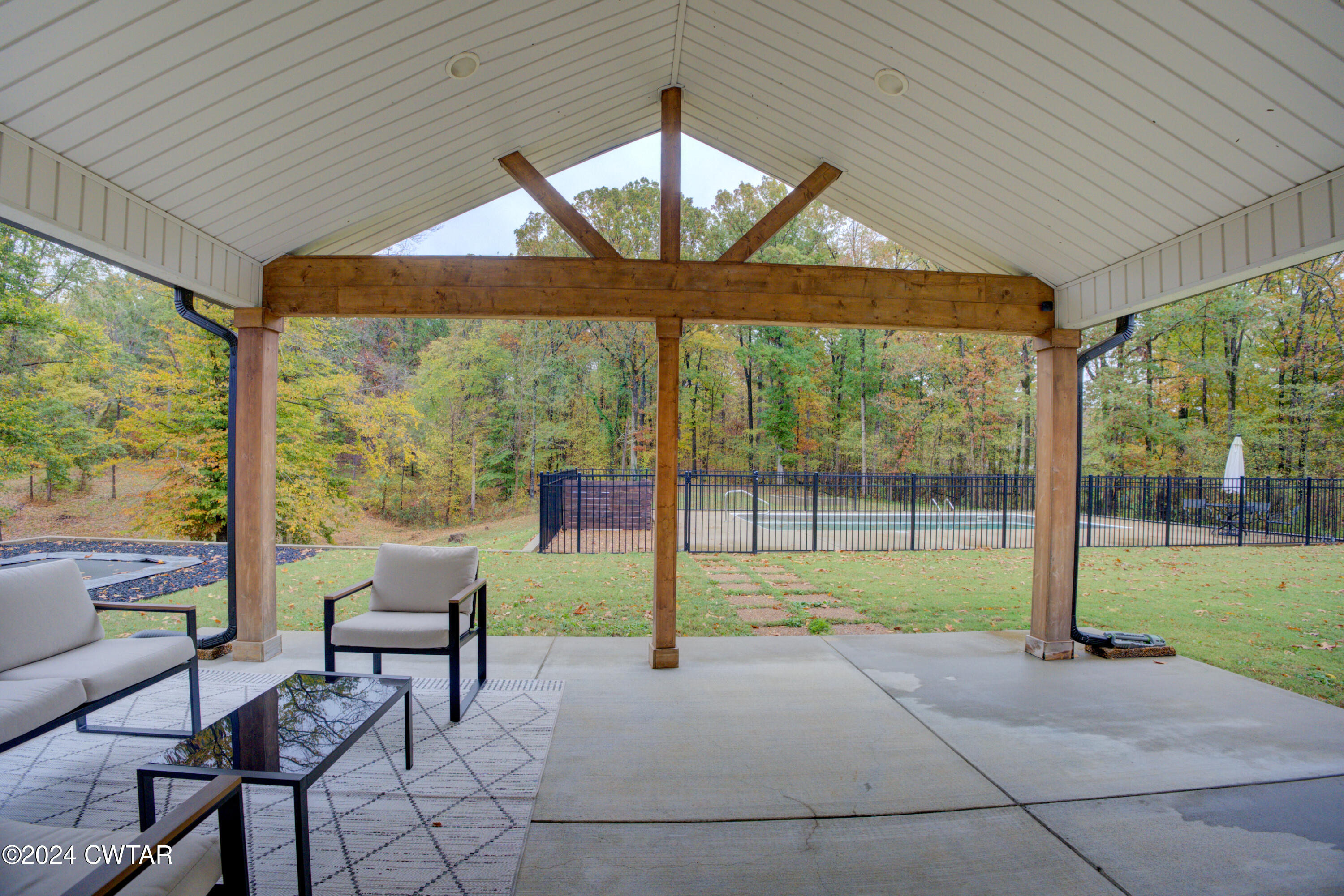 3922 Old Medina Road Medina, TN 38355 - Photo 43 of 51 a view of a patio with a table chairs and a backyard