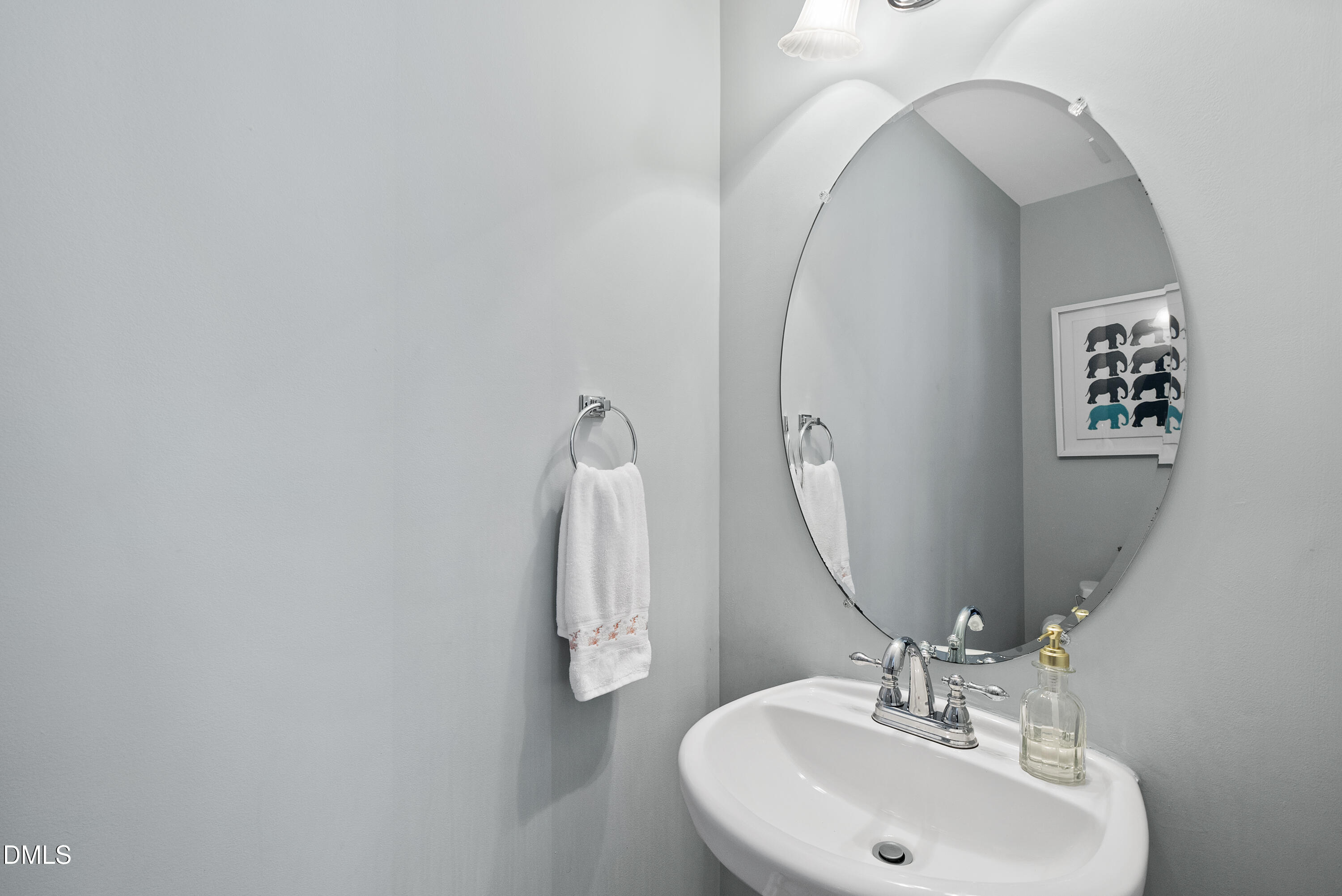 6025 History Trail Raleigh, NC 27612 - Photo 10 of 33 a bathroom with a sink and a mirror
