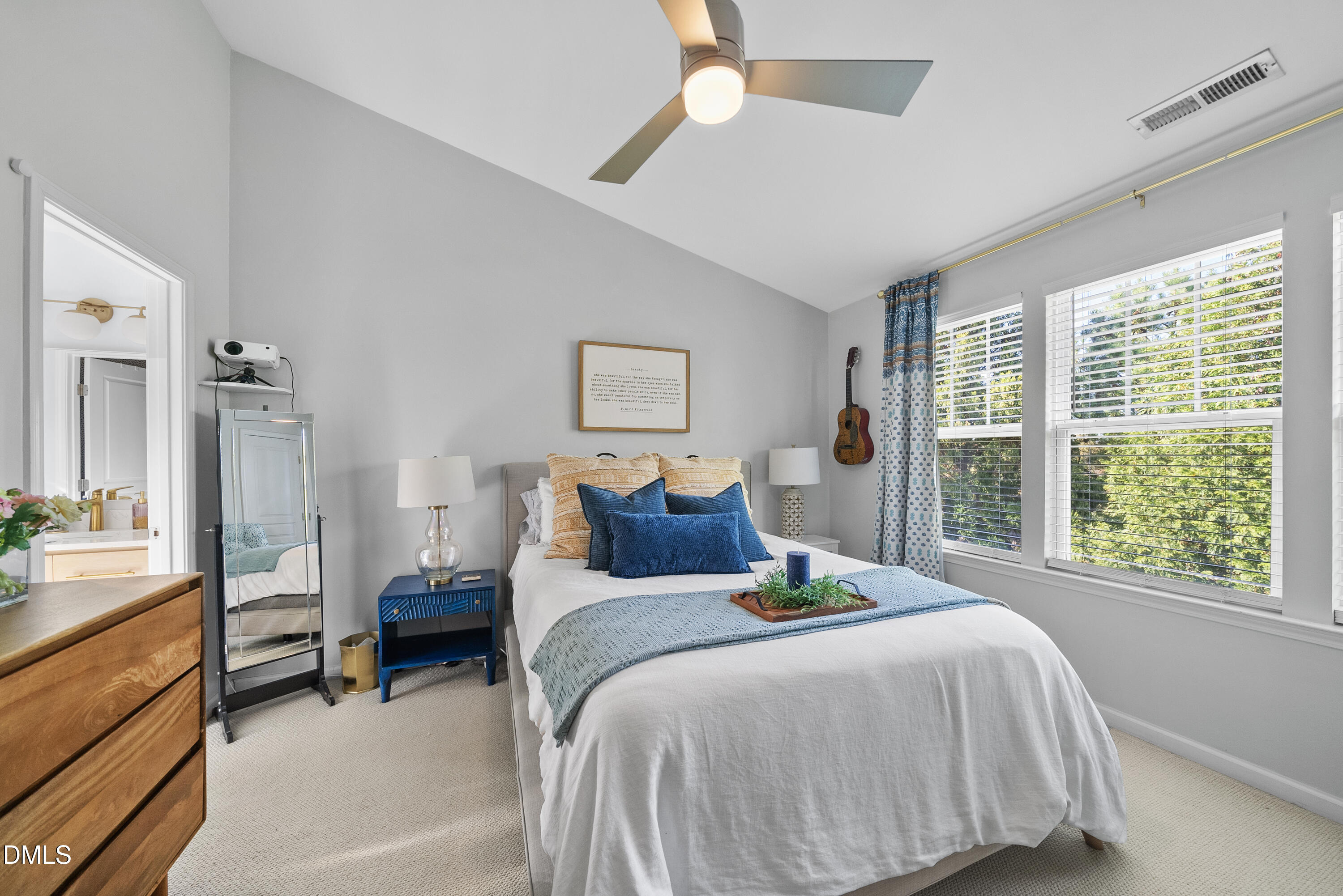 6025 History Trail Raleigh, NC 27612 - Photo 21 of 33 a bedroom with a bed and a large window