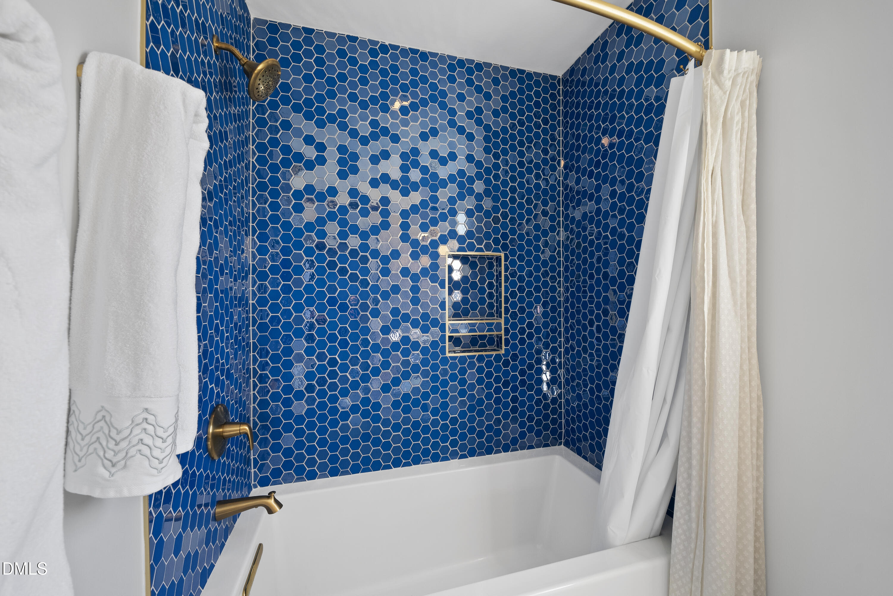 6025 History Trail Raleigh, NC 27612 - Photo 24 of 33 a bathroom with a bathtub