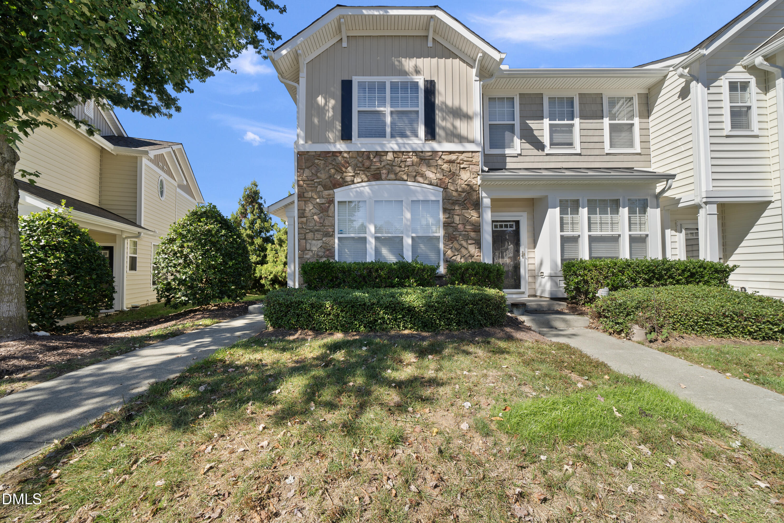 6025 History Trail Raleigh, NC 27612 - Photo 2 of 33 a front view of a house with a garden