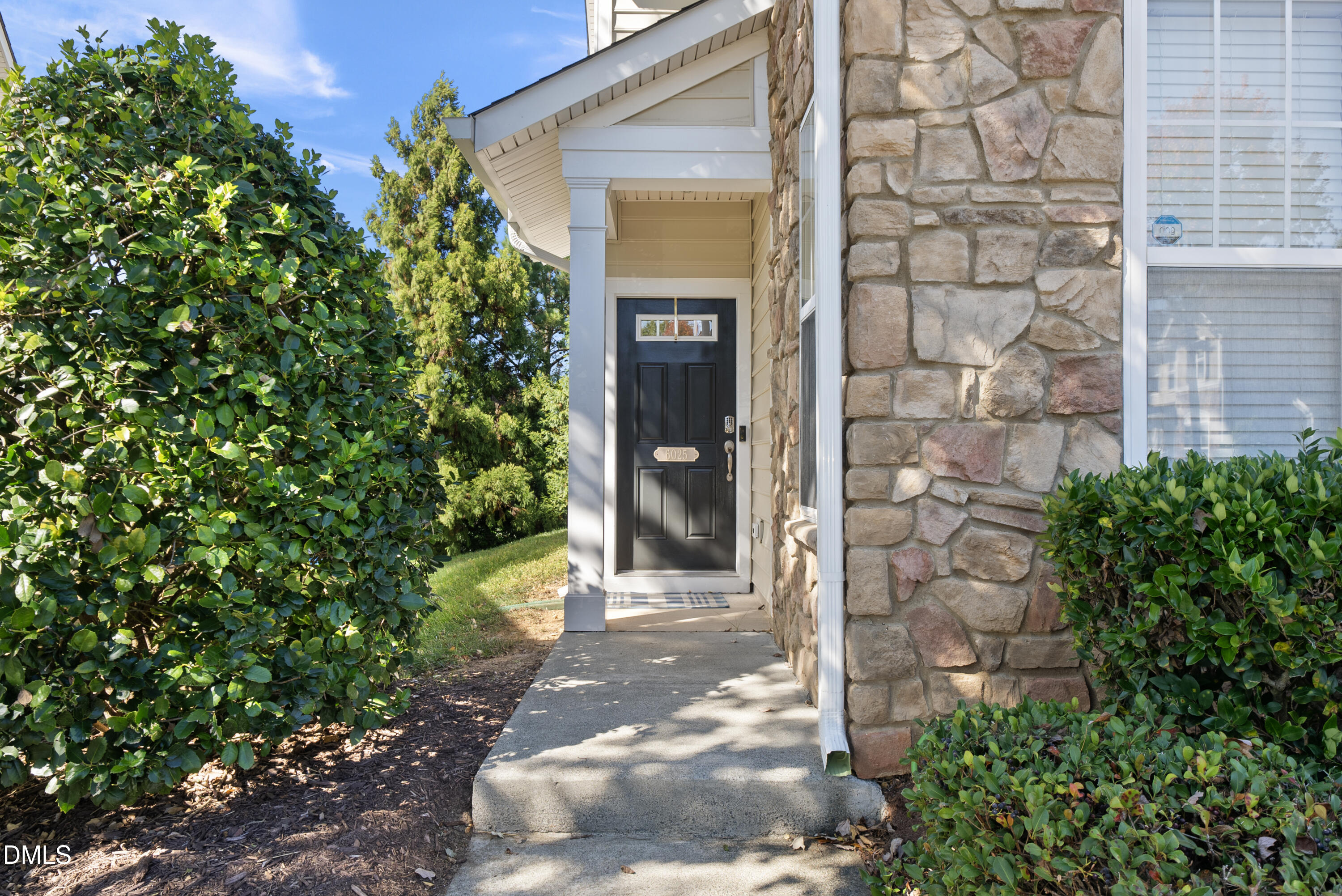 6025 History Trail Raleigh, NC 27612 - Photo 3 of 33 a view of a door of the house with a tree
