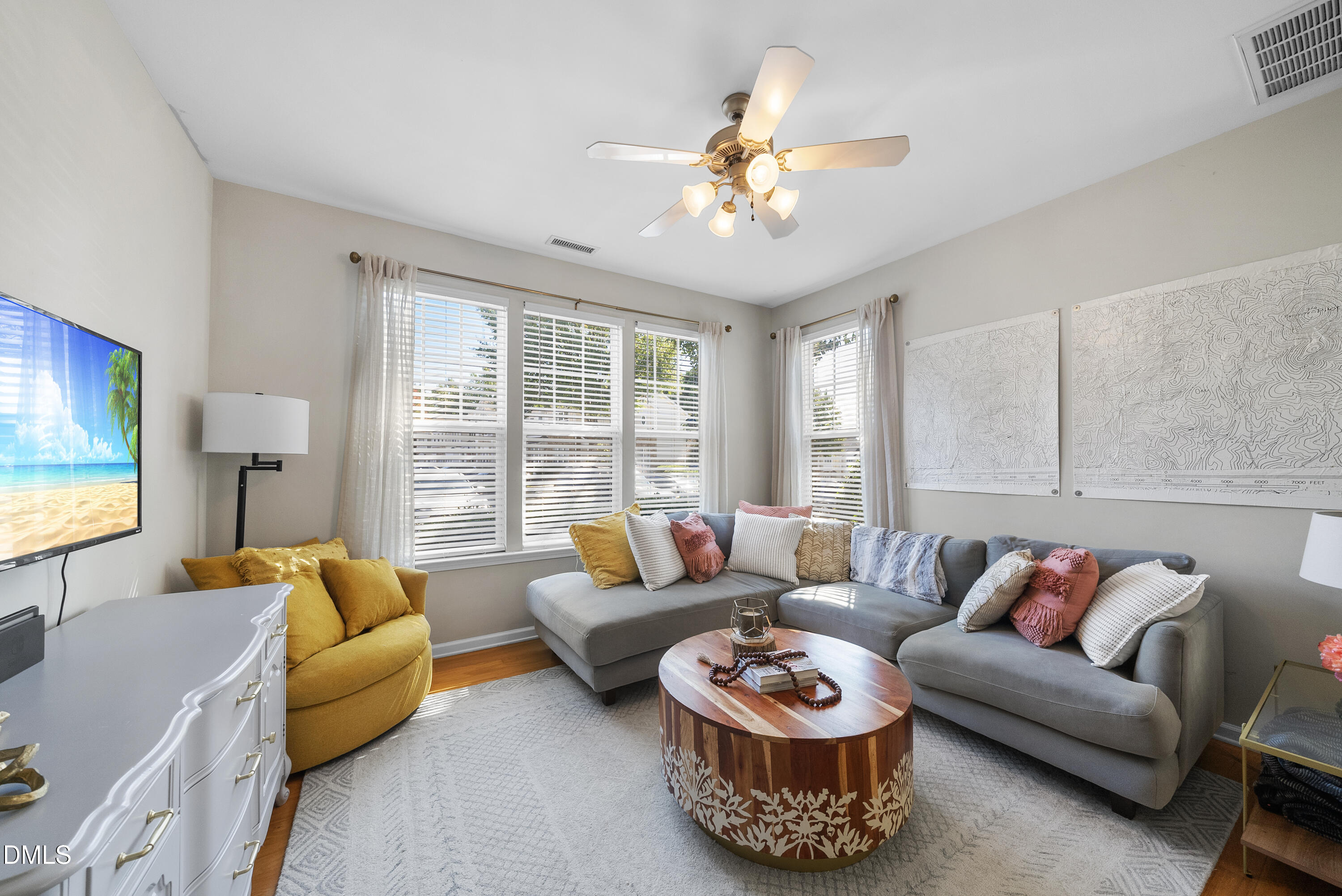 6025 History Trail Raleigh, NC 27612 - Photo 6 of 33 a living room with furniture and a large window