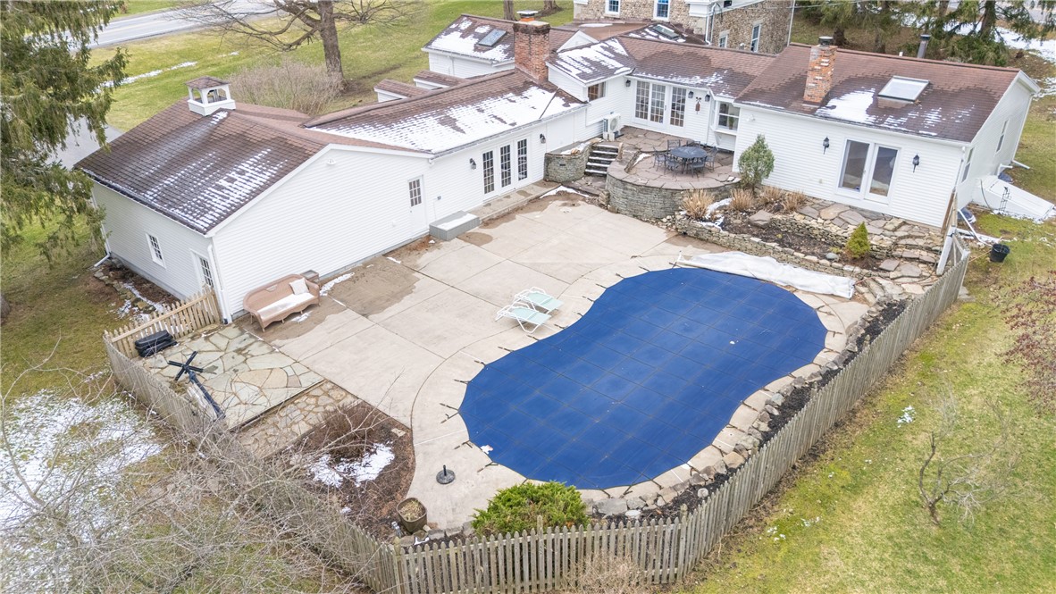 7834 N Road Victor, NY 14564 - Photo 4 of 47 Back patio and gunite pool