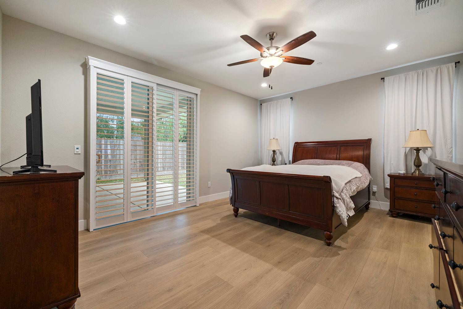 3700 Colorado Avenue Turlock, CA 95382 - Photo 18 of 46 a bedroom with a large bed and a large window