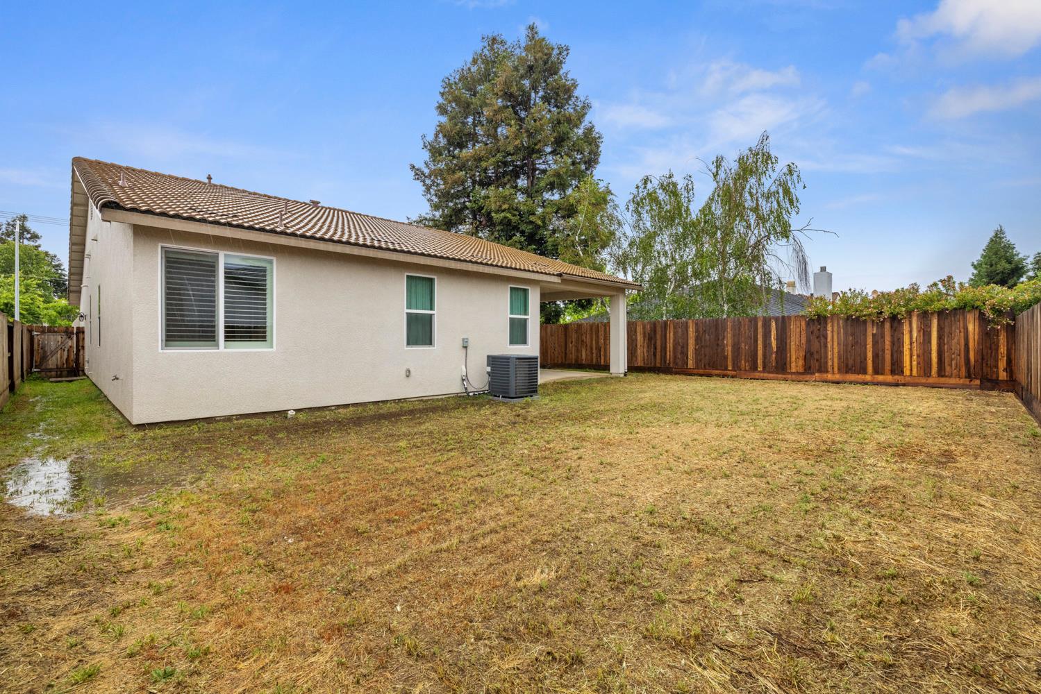 3700 Colorado Avenue Turlock, CA 95382 - Photo 34 of 46 a front view of a house with garden