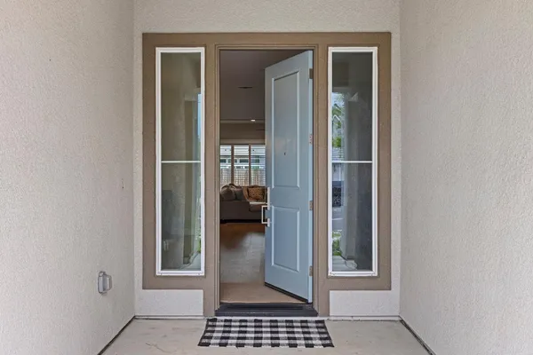 a view of a bedroom from a hallway