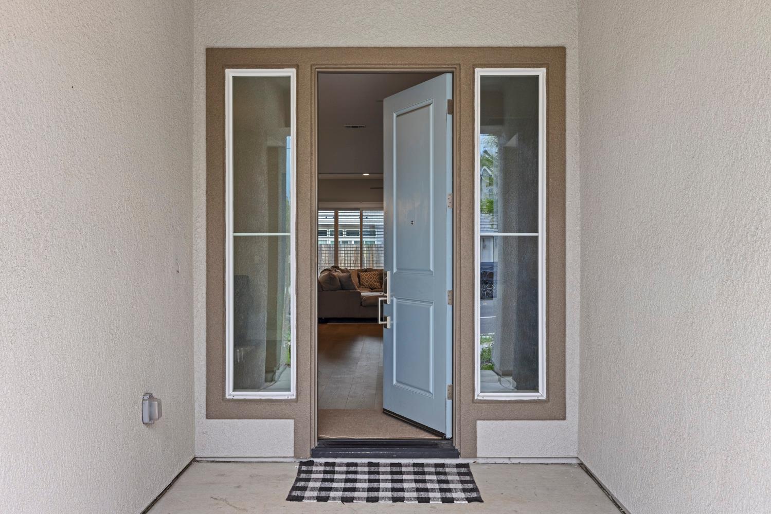 3700 Colorado Avenue Turlock, CA 95382 - Photo 4 of 46 a view of a bedroom from a hallway