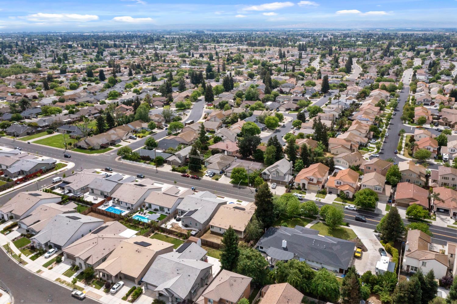 3700 Colorado Avenue Turlock, CA 95382 - Photo 41 of 46 an aerial view of a city with lots of residential buildings