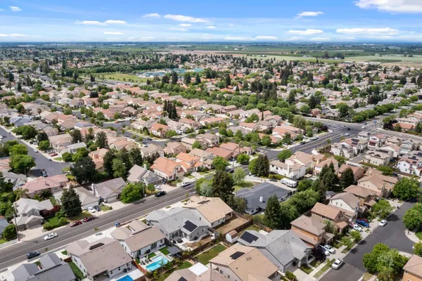 an aerial view of residential building with parking space