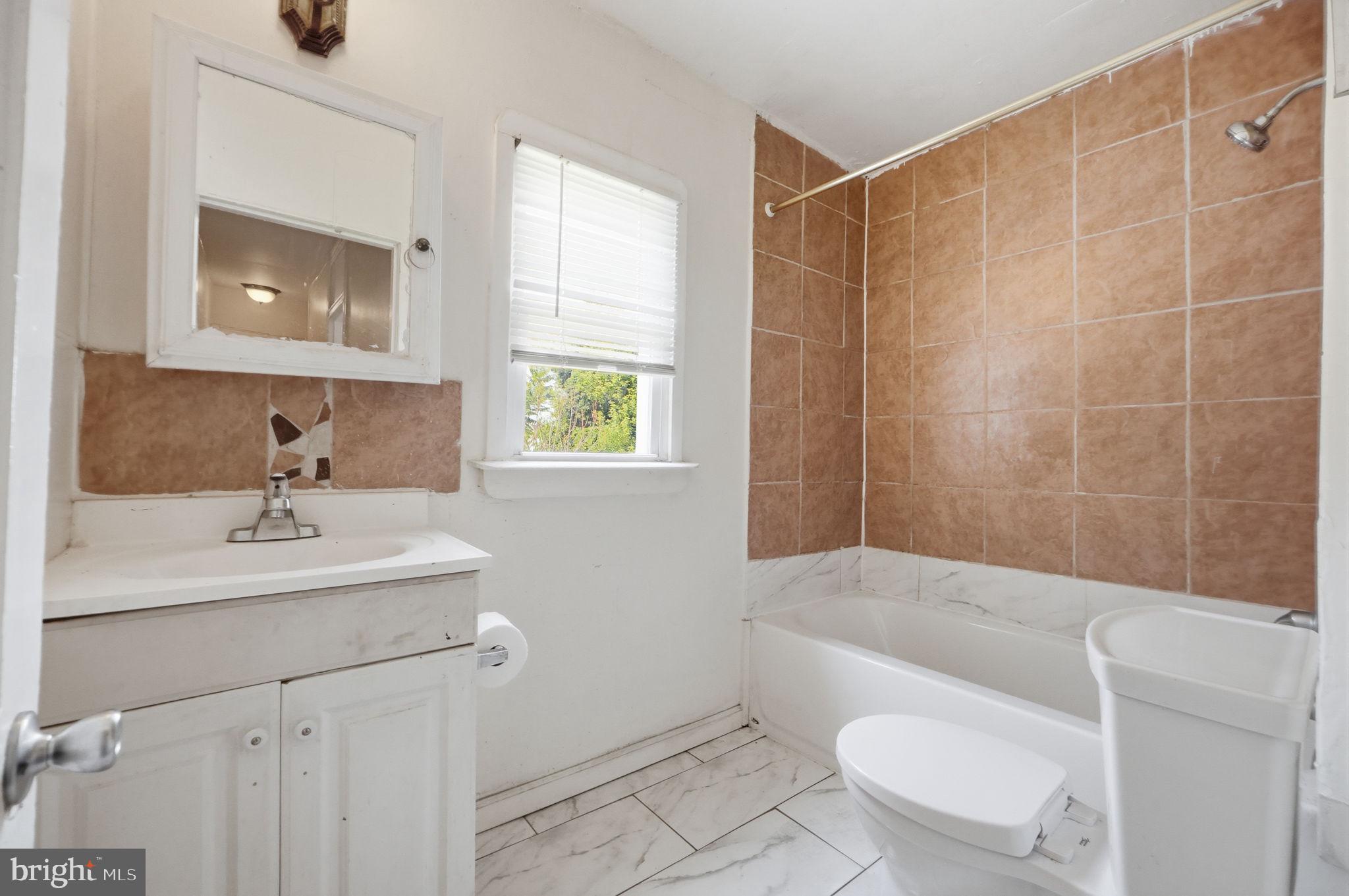 3449 Old Frederick Road Baltimore, MD 21229 - Photo 17 of 25 Bright and inviting bathroom retreat.