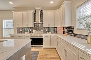 825 Beryl Street Southwest Atlanta, GA 30310 - Photo 4 of 19 a kitchen with stainless steel appliances a stove sink and cabinets