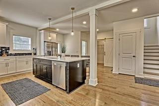 825 Beryl Street Southwest Atlanta, GA 30310 - Photo 6 of 19 a kitchen with stainless steel appliances granite countertop a stove a sink and a refrigerator