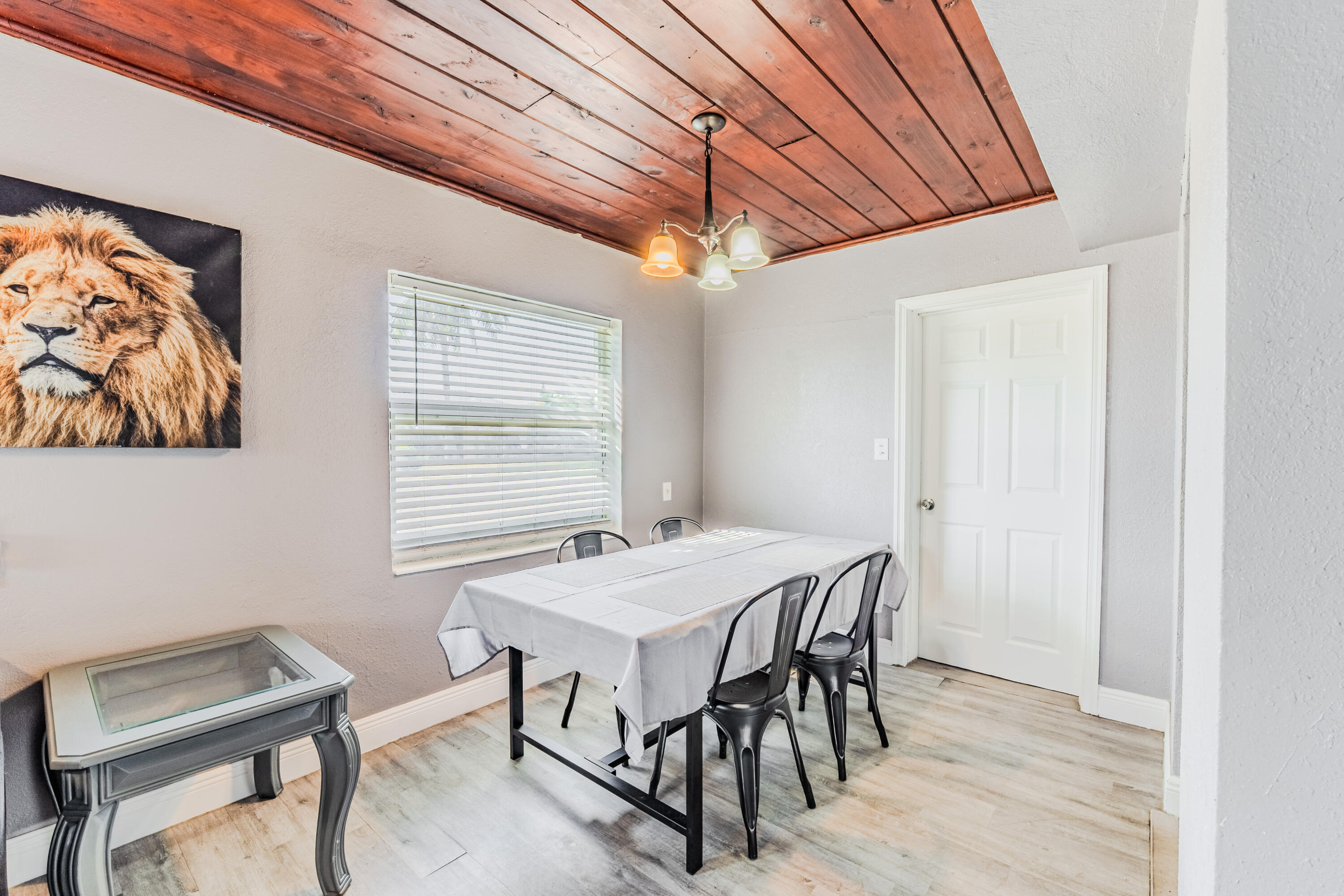 112 West 34th Street, Unit 1 Riviera Beach, FL 33404 - Photo 5 of 23 a view of a dining room with furniture and window