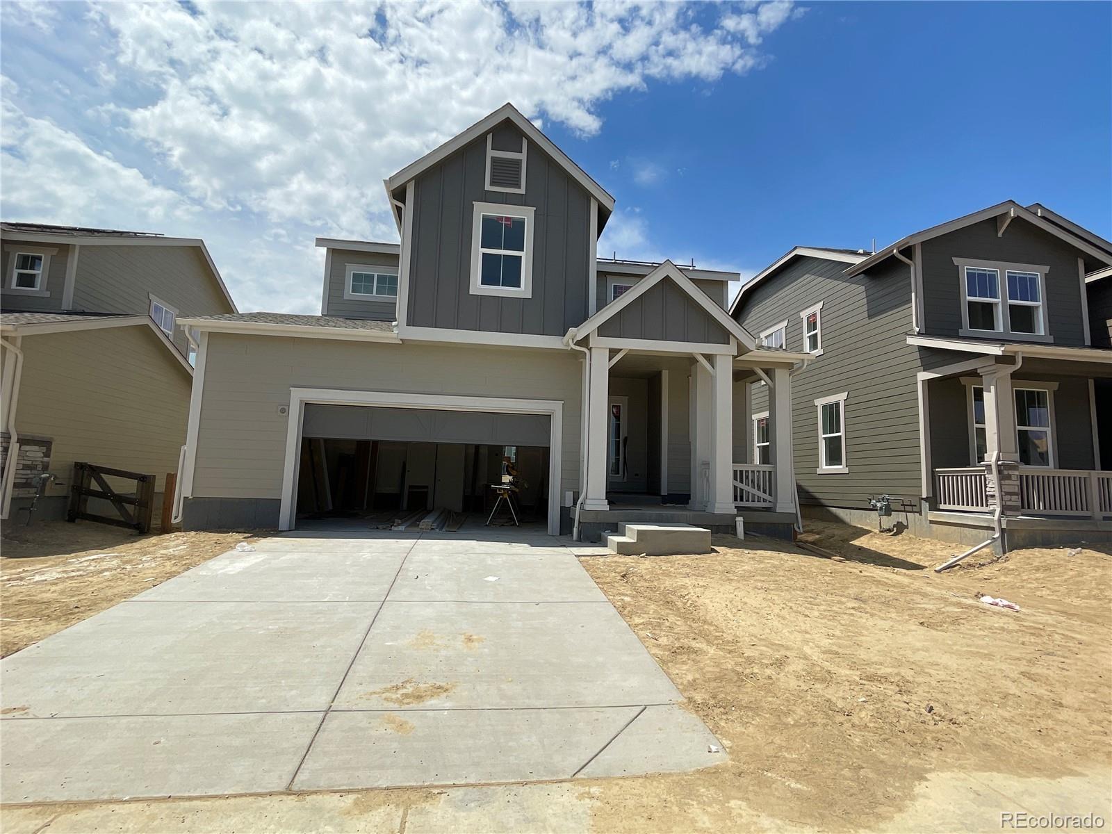 12901 Range Street Firestone, CO 80504 - Photo 1 of 12 a front view of a house with yard