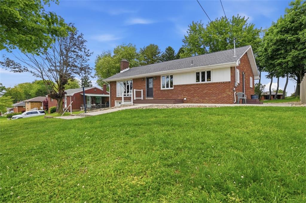 6 Greenview Drive McKees Rocks, PA 15136 - Photo 2 of 44 a front view of a house with a yard