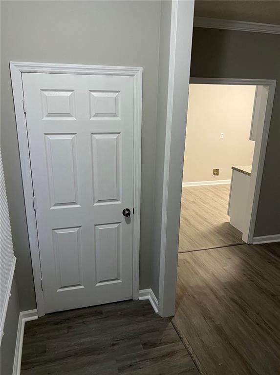 2716 Spenola Street Columbus, GA 31906 - Photo 3 of 11 an empty room with wooden floor and entrance
