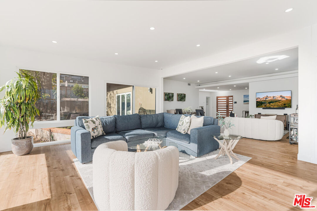 2204 Ridgemont Drive Los Angeles, CA 90046 - Photo 21 of 34 a living room with furniture and a large window