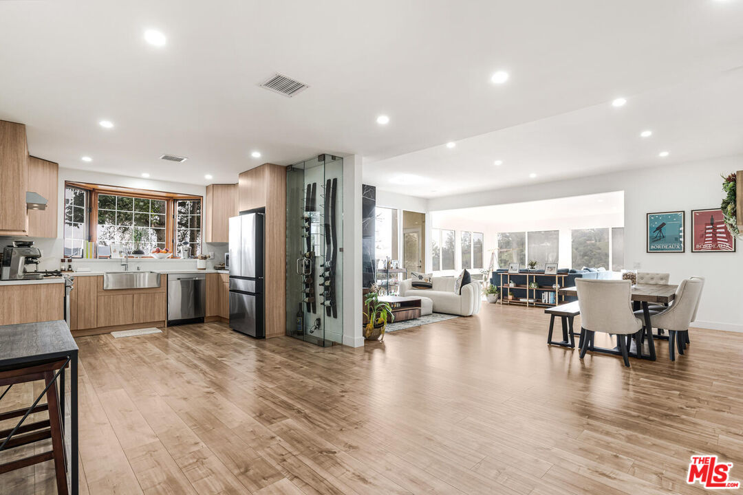 2204 Ridgemont Drive Los Angeles, CA 90046 - Photo 4 of 34 a view of a kitchen and dining room