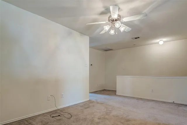 a view of a livingroom with a staircase