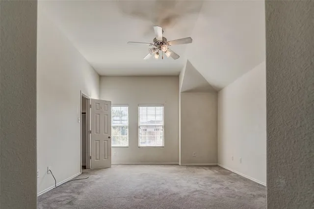 a view of a hallway with closet area