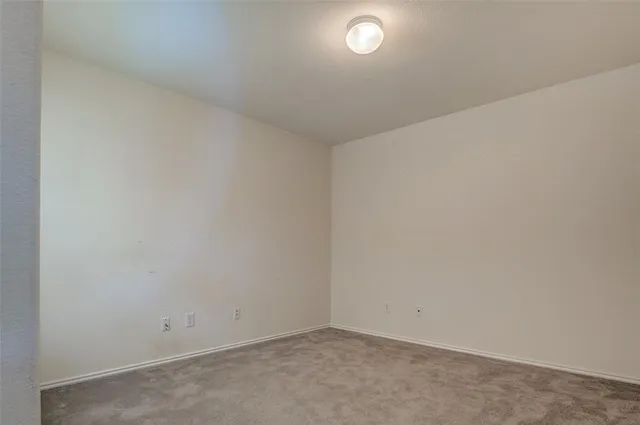 an empty room with a workbench
