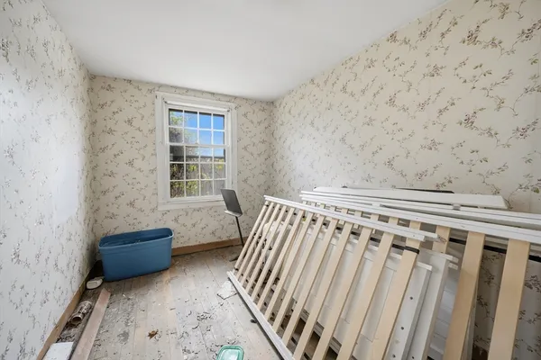 a living room with furniture and a gate