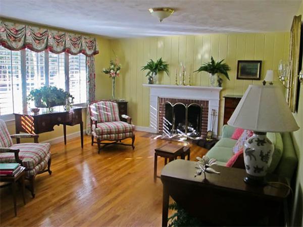 131 Cedar Road Longmeadow, MA 01106 - Photo 2 of 4 a living room with furniture and a fireplace