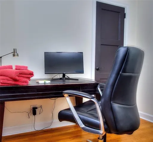 a view of workspace with lounge chair