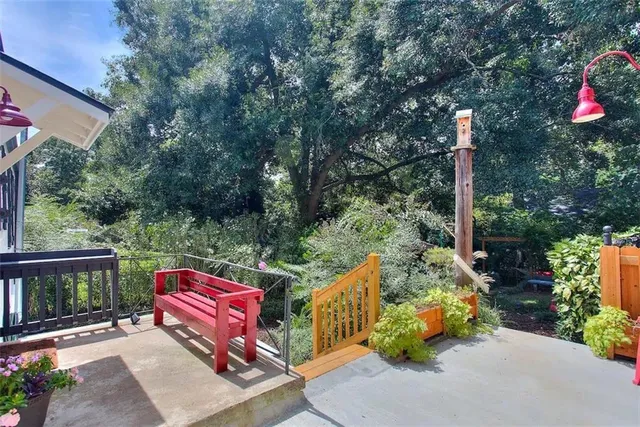 a garden view with a seating space