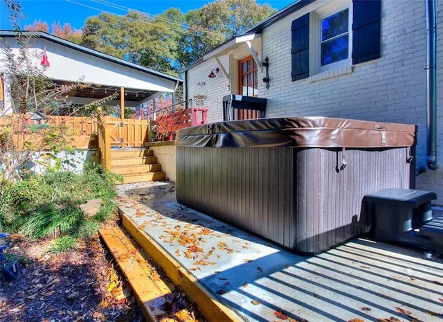 a front view of a house with lots of trees