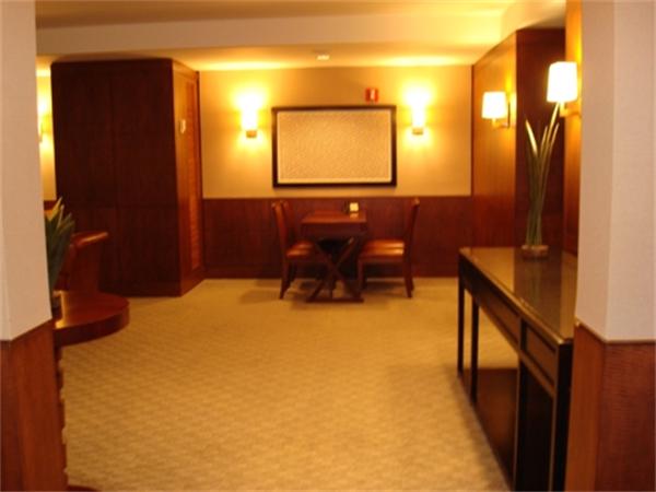 3 Avery Street, Unit 810 Boston, MA 02111 - Photo 14 of 16 a workspace with furniture and a window