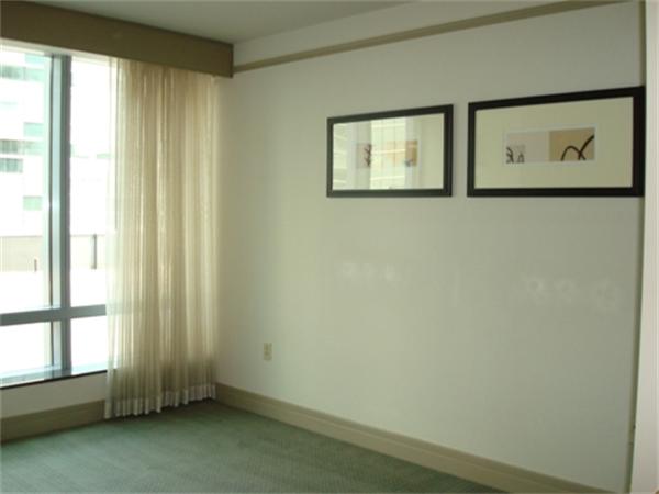 3 Avery Street, Unit 810 Boston, MA 02111 - Photo 7 of 16 a view of an empty room with a window