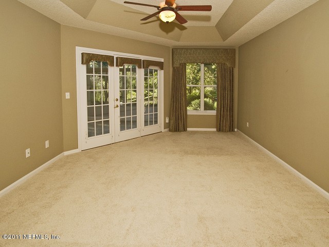 12930 Biggin Church Road South Jacksonville, FL 32224 - Photo 16 of 25 a view of an empty room with a window