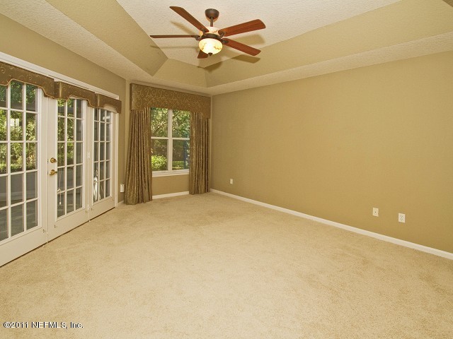 12930 Biggin Church Road South Jacksonville, FL 32224 - Photo 17 of 25 a view of an empty room with a window