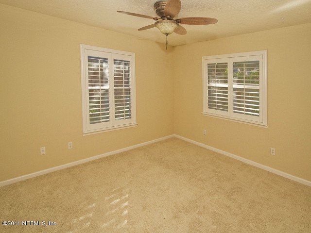 12930 Biggin Church Road South Jacksonville, FL 32224 - Photo 8 of 25 a view of an empty room with a window