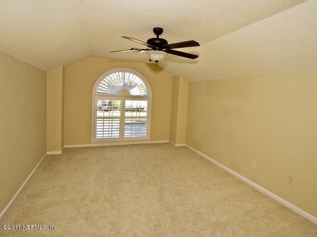 12930 Biggin Church Road South Jacksonville, FL 32224 - Photo 9 of 25 wooden floor in an empty room with a window