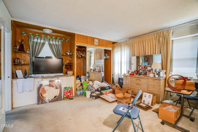 a bathroom with a sink toilet and mirror