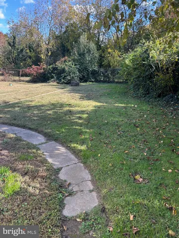 a view of a yard with an outdoor space