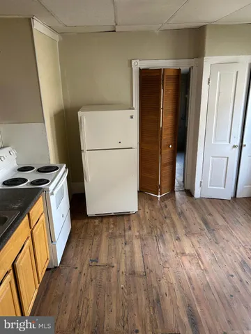 a view of storage and utility room with washer and dryer