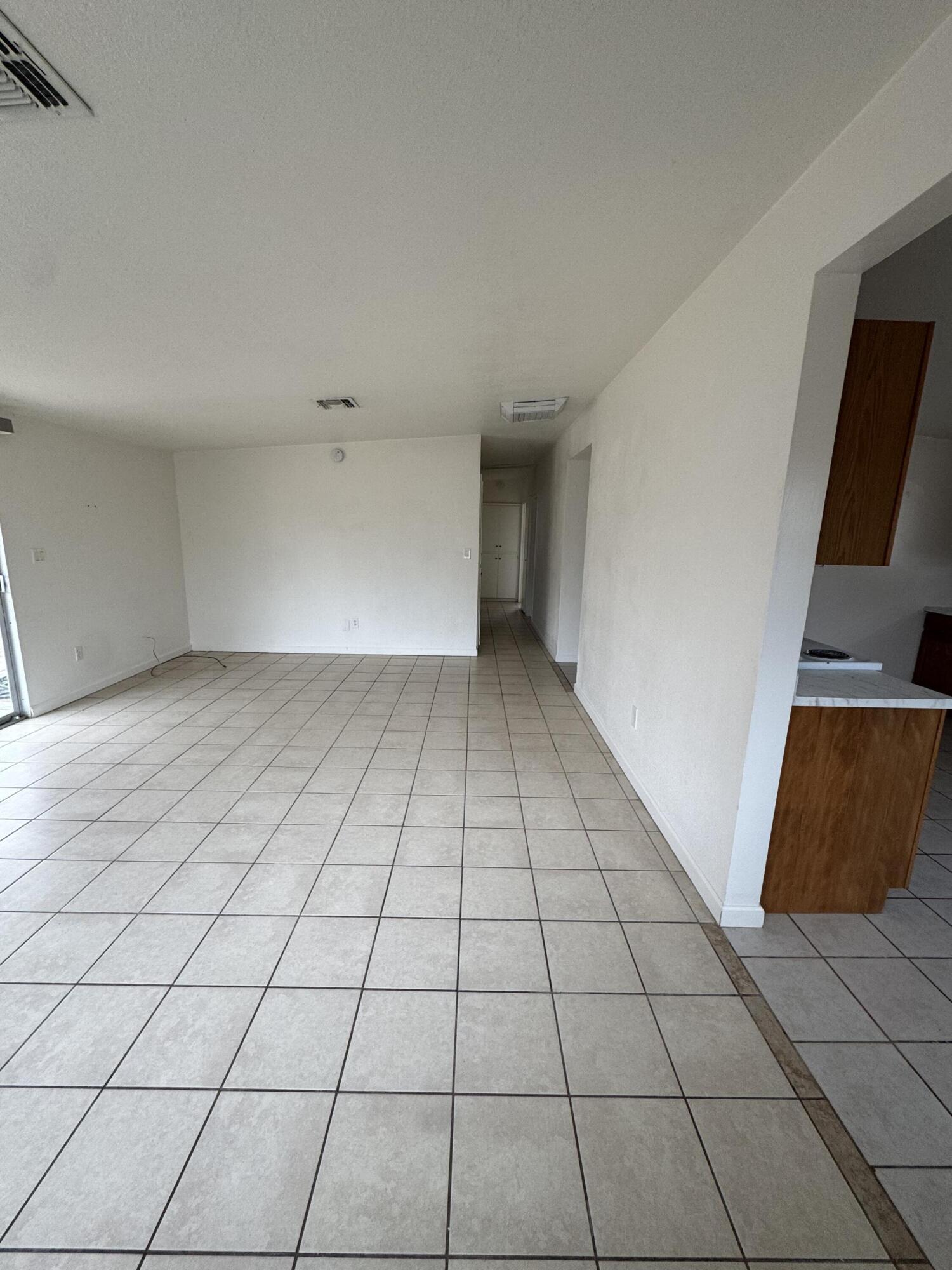 5958 El Reposo Street Joshua Tree, CA 92252 - Photo 16 of 30 a view of an empty room and window