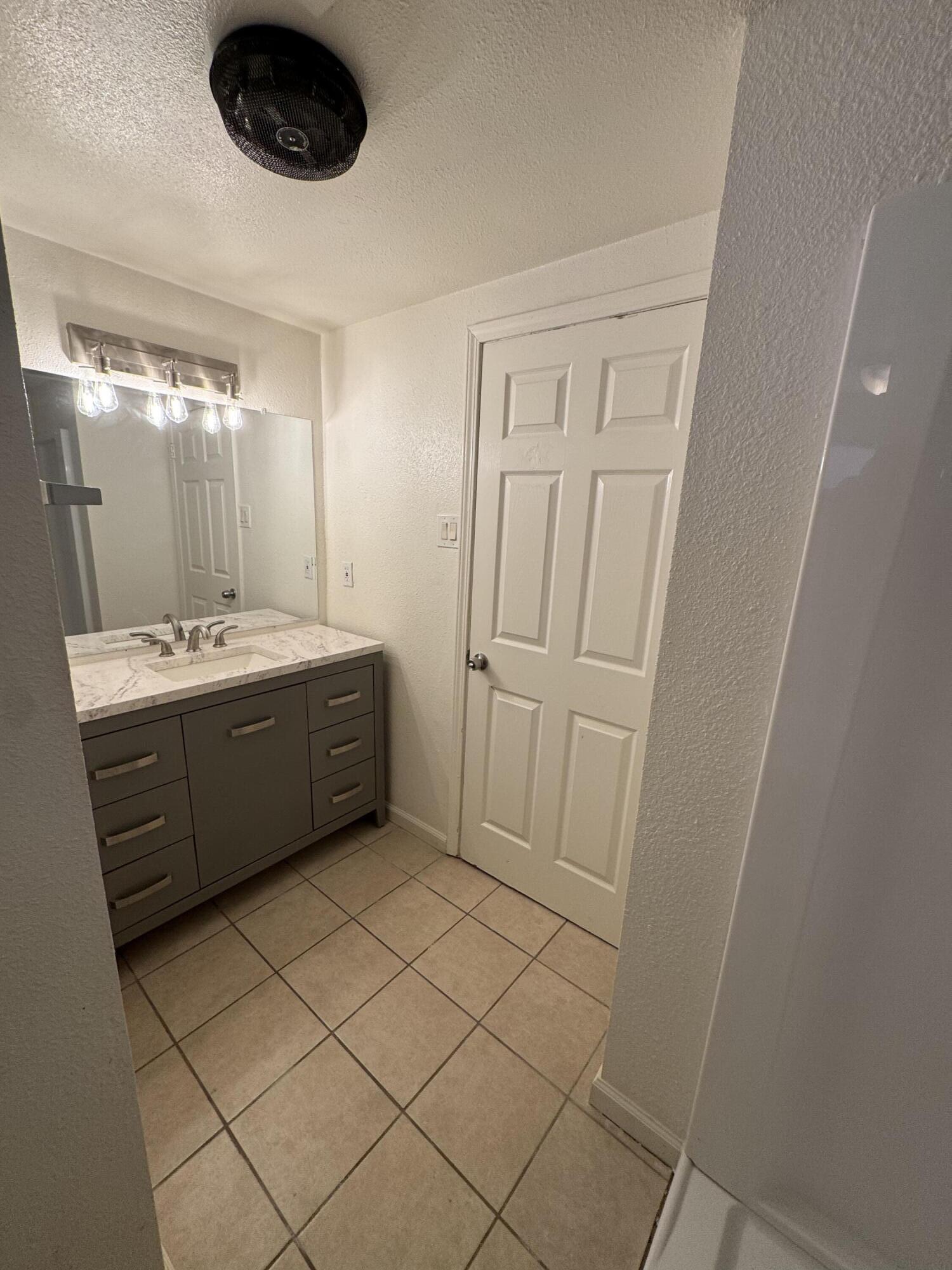5958 El Reposo Street Joshua Tree, CA 92252 - Photo 21 of 30 a room with a sink and a mirror