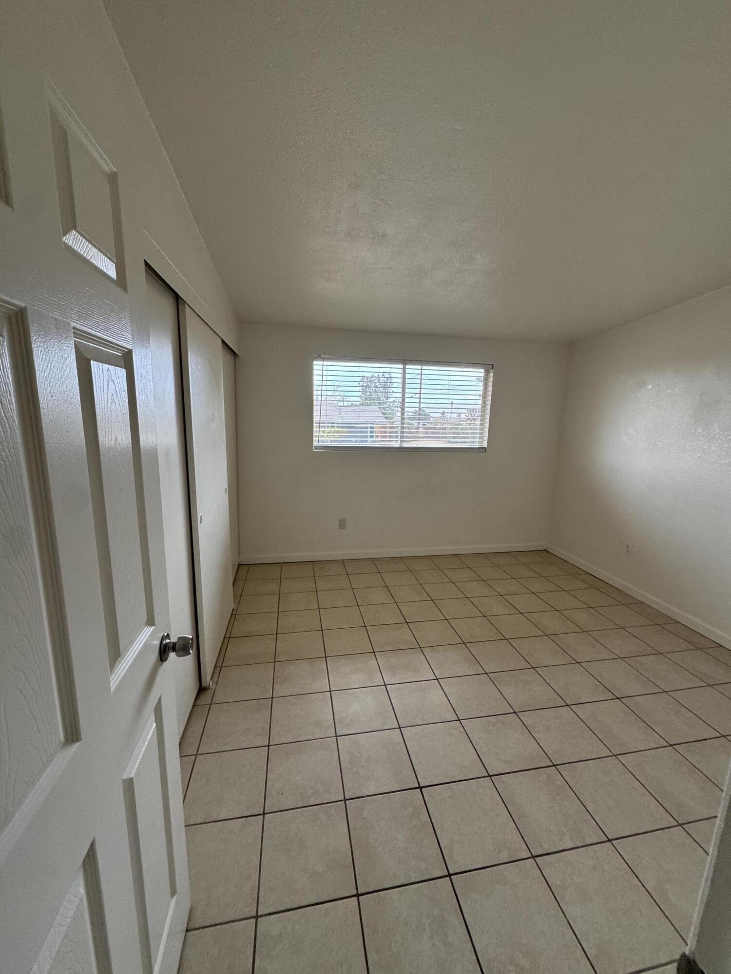 5958 El Reposo Street Joshua Tree, CA 92252 - Photo 25 of 30 a view of an empty room and window