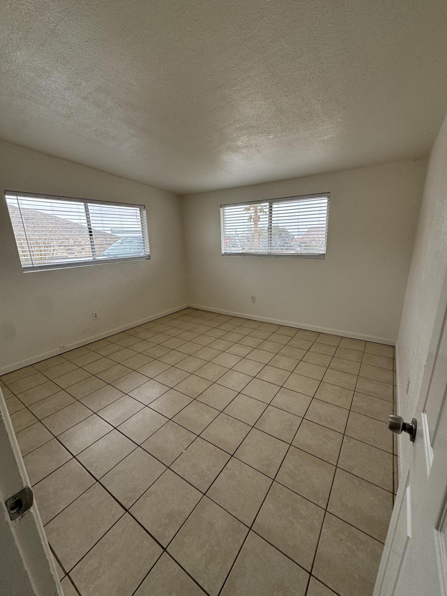 5958 El Reposo Street Joshua Tree, CA 92252 - Photo 26 of 30 an empty room with windows