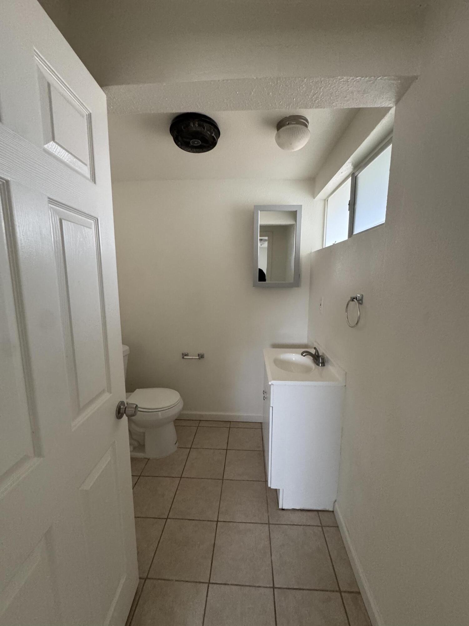 5958 El Reposo Street Joshua Tree, CA 92252 - Photo 28 of 30 a room with a washer and dryer