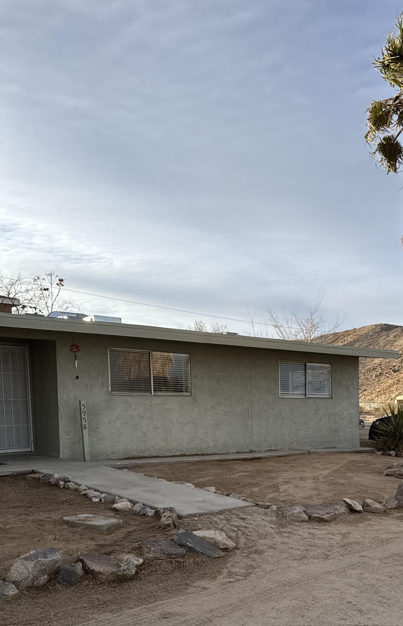 5958 El Reposo Street Joshua Tree, CA 92252 - Photo 8 of 30 a front view of a house