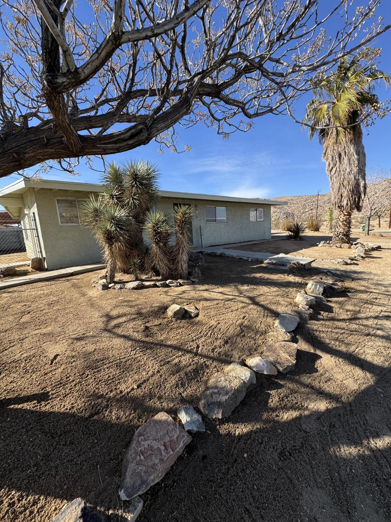5958 El Reposo Street Joshua Tree, CA 92252 - Photo 9 of 30 a view of a house with a snow on the road