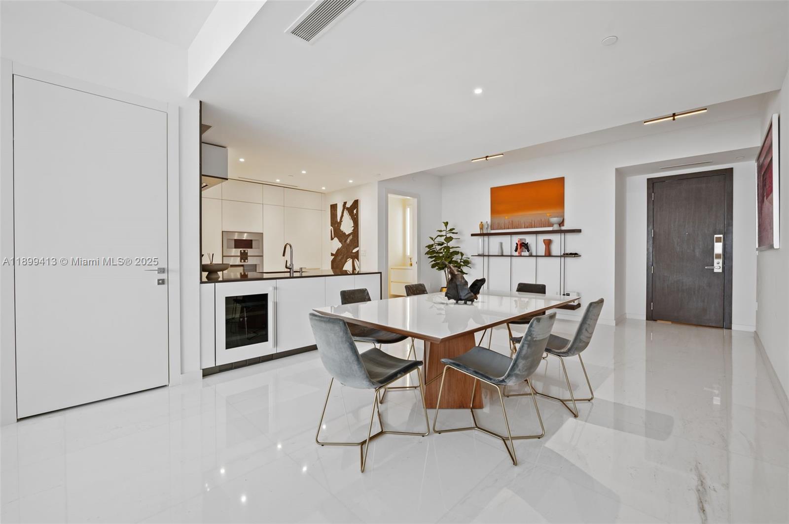 300 Biscayne Blvd Way, Unit 4909W Miami, FL 33131 - Photo 4 of 47 a view of a dining room with furniture and wooden floor