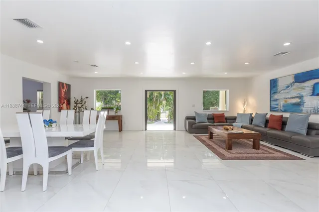 a view of entryway with stairs and wooden floor